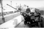 German 2 cm FlaK 30 gun at Marseille, France,  Feb-Mar 1943; note transport Président Dal Piaz in background