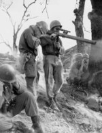 Man of 9th Infantry, US 2nd Infantry Division firing a M18A1 recoilless gun, Korea, 5 Sep 1951