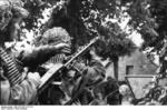 German paratrooper with MG42 machine gun, France, 21 Jun 1944, photo 2 of 5