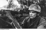 German paratrooper with MG42 machine gun, France, 21 Jun 1944, photo 4 of 5