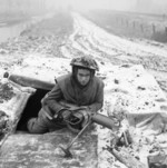 PIAT gunner of 1st Battalion Rifle Brigade, British 7th Armoured Division, 28 Dec 1944