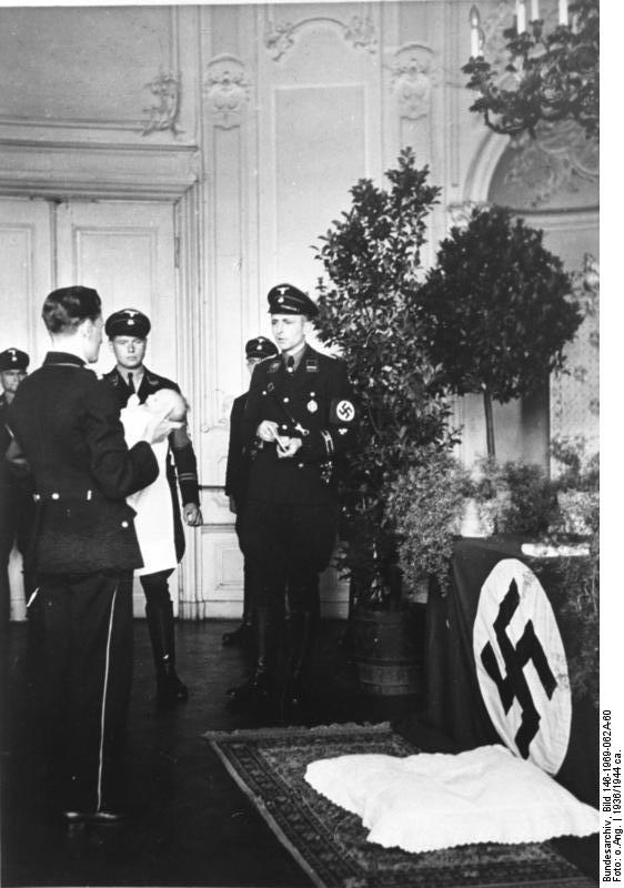 Baptism of a child born to a Lebensborn member, Germany, 1936, photo 2 of 4