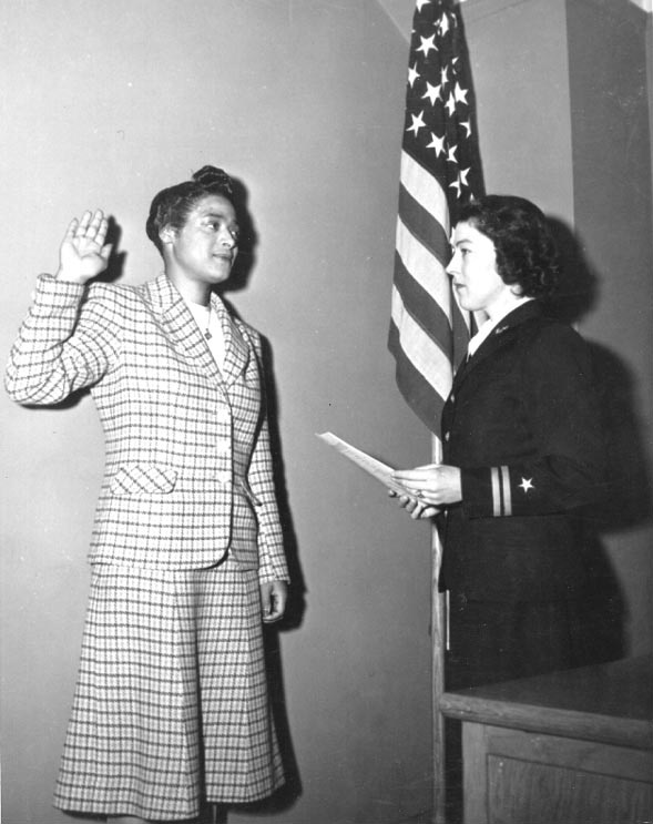 Harriet Ida Pickens being sworn in as WAVES apprentice seamen by Lieutenant Rosamond D. Selle, New York, New York, United States, Nov 1944