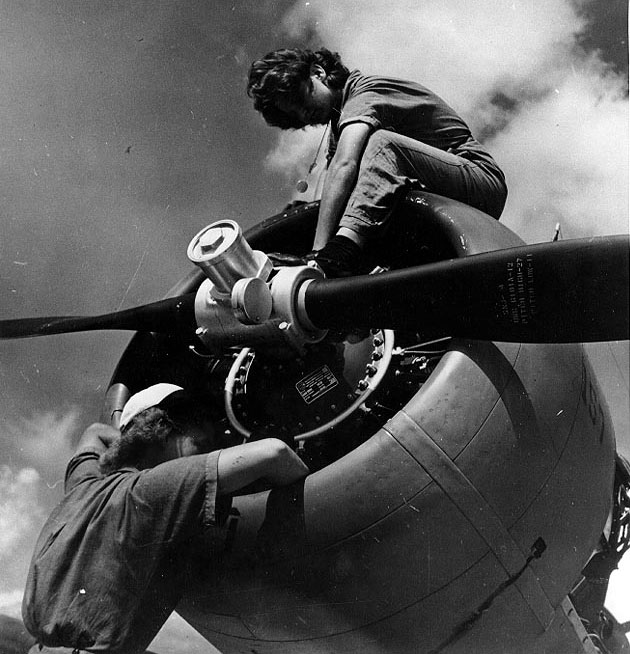 WAVES Aviation Machinist's Mates Bernice Snasburg and Violet Falkum working on the Pratt & Whitney radial engine of SNJ-4 aircraft, Naval Air Station, Jacksonville, Florida, United States, 30 Nov 1943