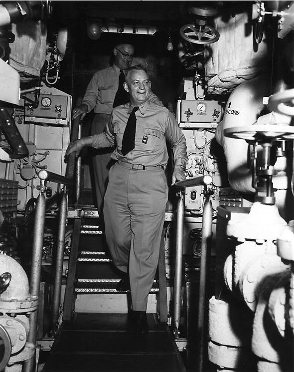 Rear Admiral Burke touring nuclear submarine USS Nautilus, New London Submarine Base, Groton, Connecticut, United States, 31 May 1955