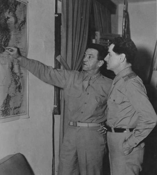 Claire Chennault studying a map, China, 1940s