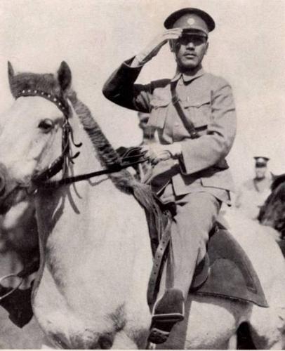 Chiang Kaishek reviewing troops on a horse, China, 1926