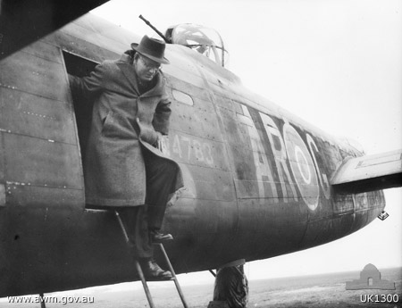 Prime Minister John Curtin exiting from Lancaster bomber 'G for George', RAF Binbrook, Lincolnshire, England, United Kingdom, circa May 1944