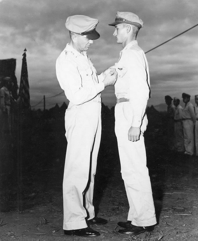 George Kenney decorating USAAF 3rd Bomb Group Captain Dick Walker, Nadzab Airfield, Australian New Guinea, Feb 1944