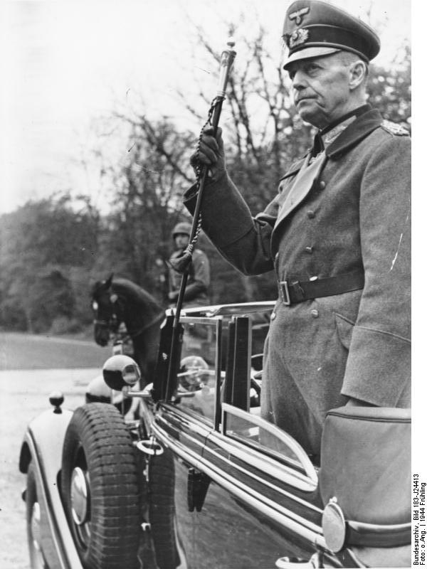 Rundstedt reviewing troops from a convertible sedan, spring 1944