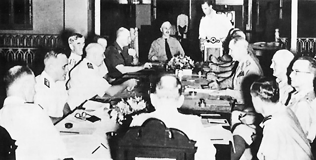 The first ABDA command meeting, 10 Jan 1942; left to right: Geoffrey Layton, Conrad Helfrich, Thomas Hart, Hein ter Poorten, Emile Kengen, Archibald Wavell, George Brett, and Lewis Bereton