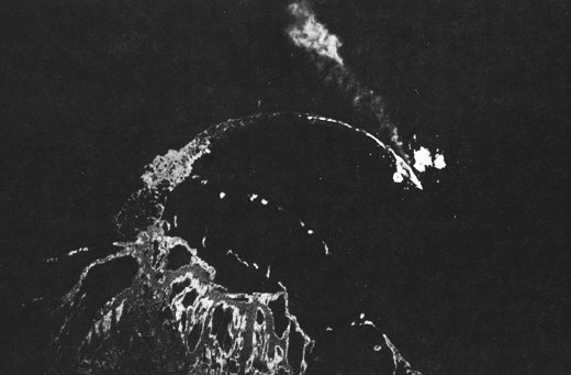 Japanese battleship Hiei evading aerial bombing, north of Savo Island, Solomon Islands, 13 Nov 1942; seen from a B-17 aircraft of US 11th Bombardment Group