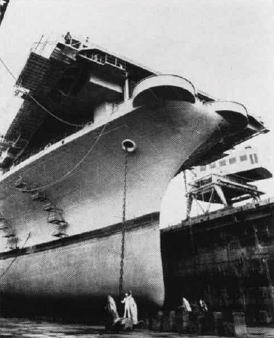 USS Ticonderoga in a drydock, mid-1950s; seen in Jan 1956 edition of US Navy publication Naval Aviation News