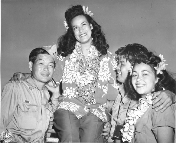 Hula dancers entertain returning Japanese-American veterans of US 442nd Regimental Combat Team aboard Victory Ship USS Waterbury Victory, Honolulu, US Territory of Hawaii, 9 Aug 1946; photo 7 of 7