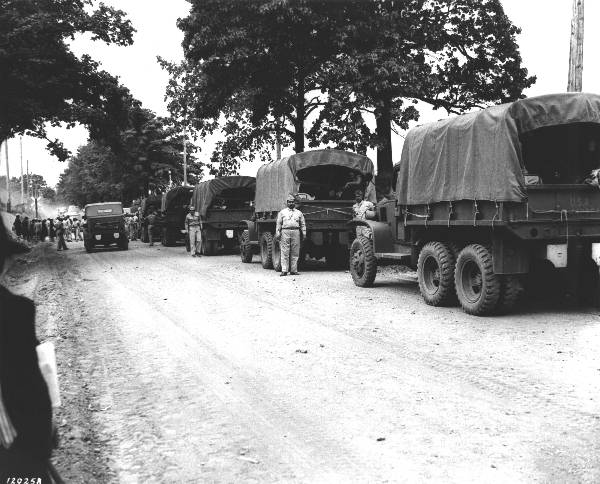 Convoy of US Army CCKW 2 1/2 ton 6x6 cargo trucks, probably in the United States during training, date unknown