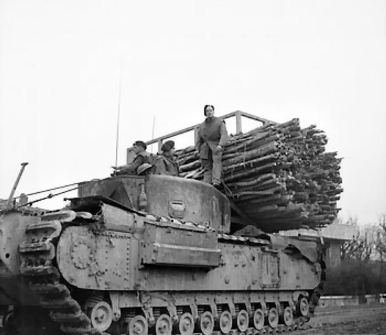 Churchill AVRE vehicle with fascine, of UK 79th (Experimental) Armored Division Royal Engineers, Italy, 19 Dec 1944