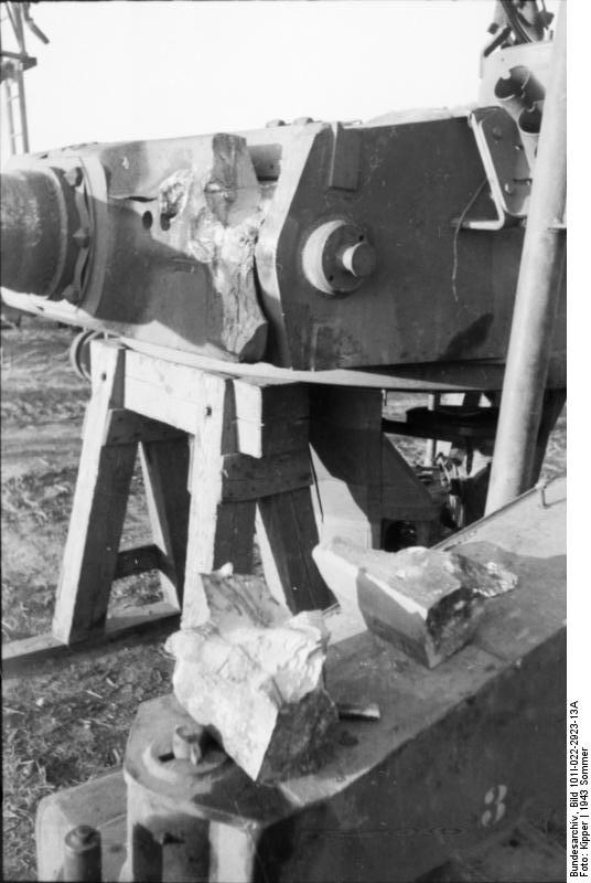 Damaged turret of a Panzer VI Tiger I heavy tank under repair, Russia, 21 Jun 1943