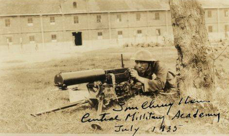 Chinese Central Military Academy cadet Sun Chengxin (Wade-Giles: Sun Chung Hsin) with a Type 24 machine gun, Nanjing, China, Jul 1935